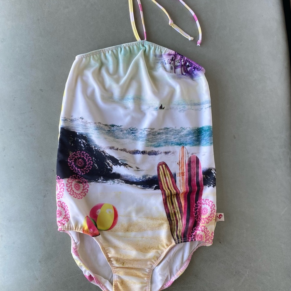Kids Ink girls, one piece, halter style swimsuit with fun ocean and beach detail